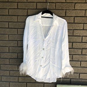 Blouse with ruffle hem